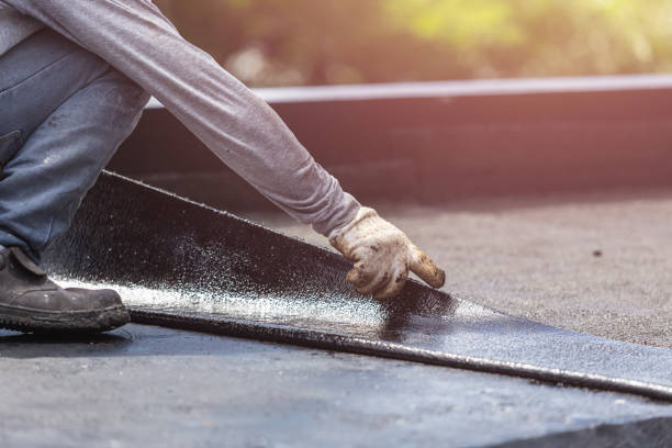 Professional Basement Waterproofing technician working in Hanceville, AL